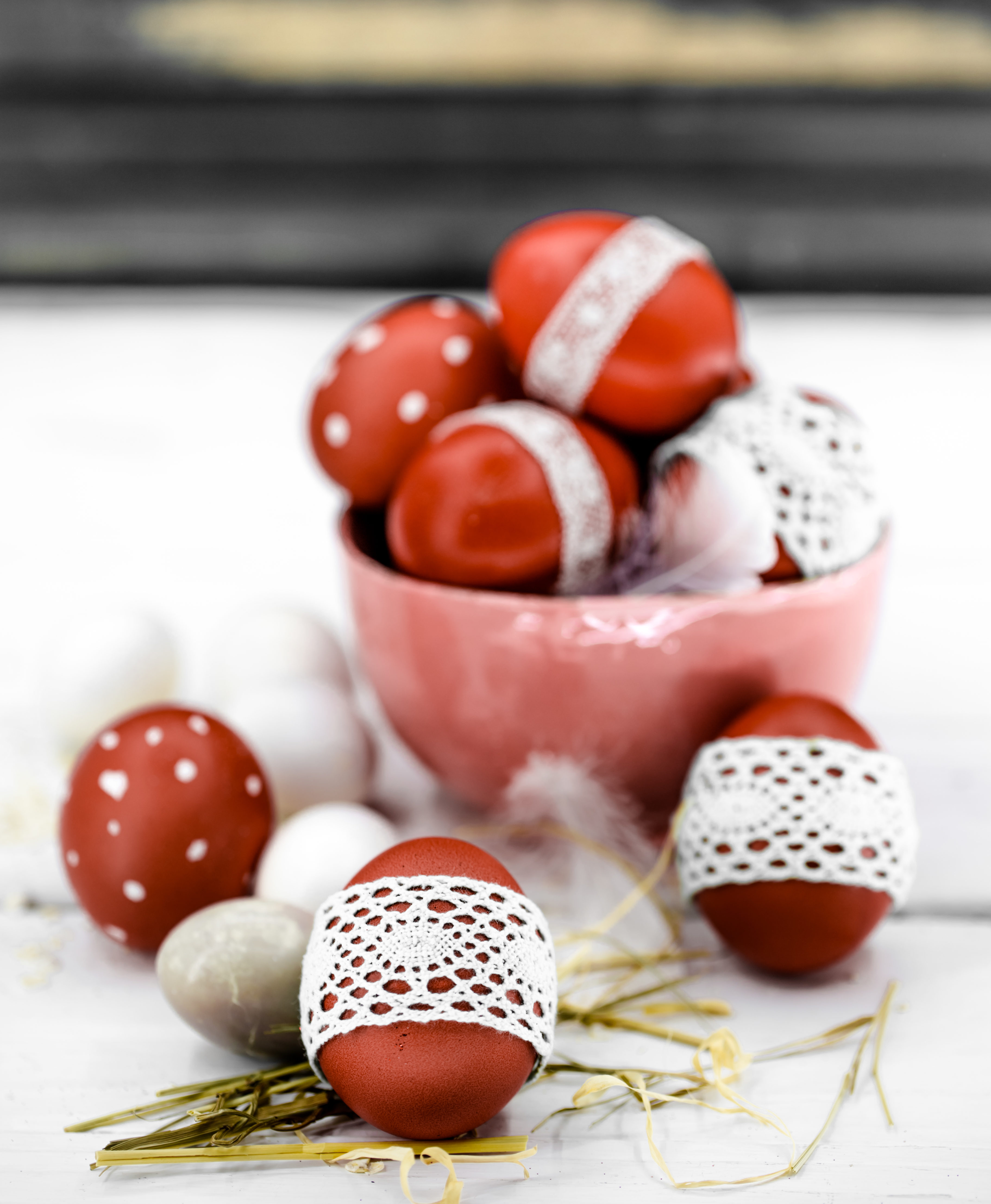 Red Easter eggs on wooden background